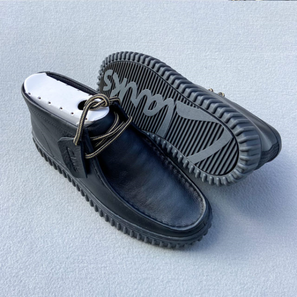 CLARKS BOTIN TORHILL HI CUERO NEGRO